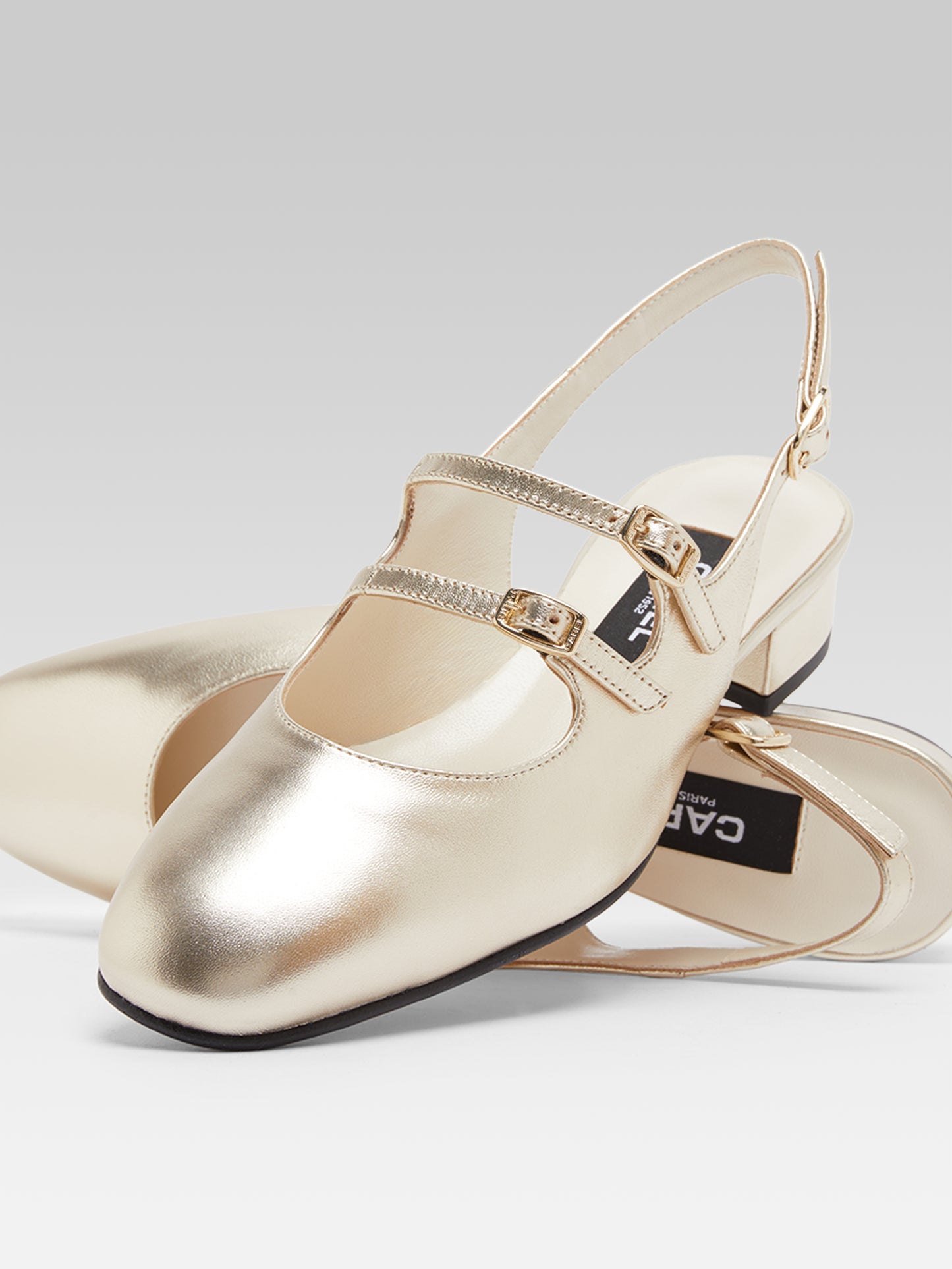 Peche - Platinum laminated leather slingback Mary Janes