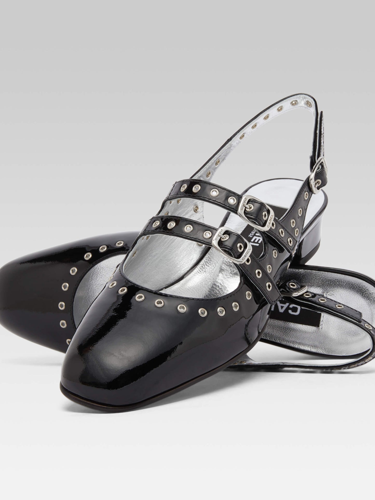 Queen - Babies slingback cuir verni noir à oeillets