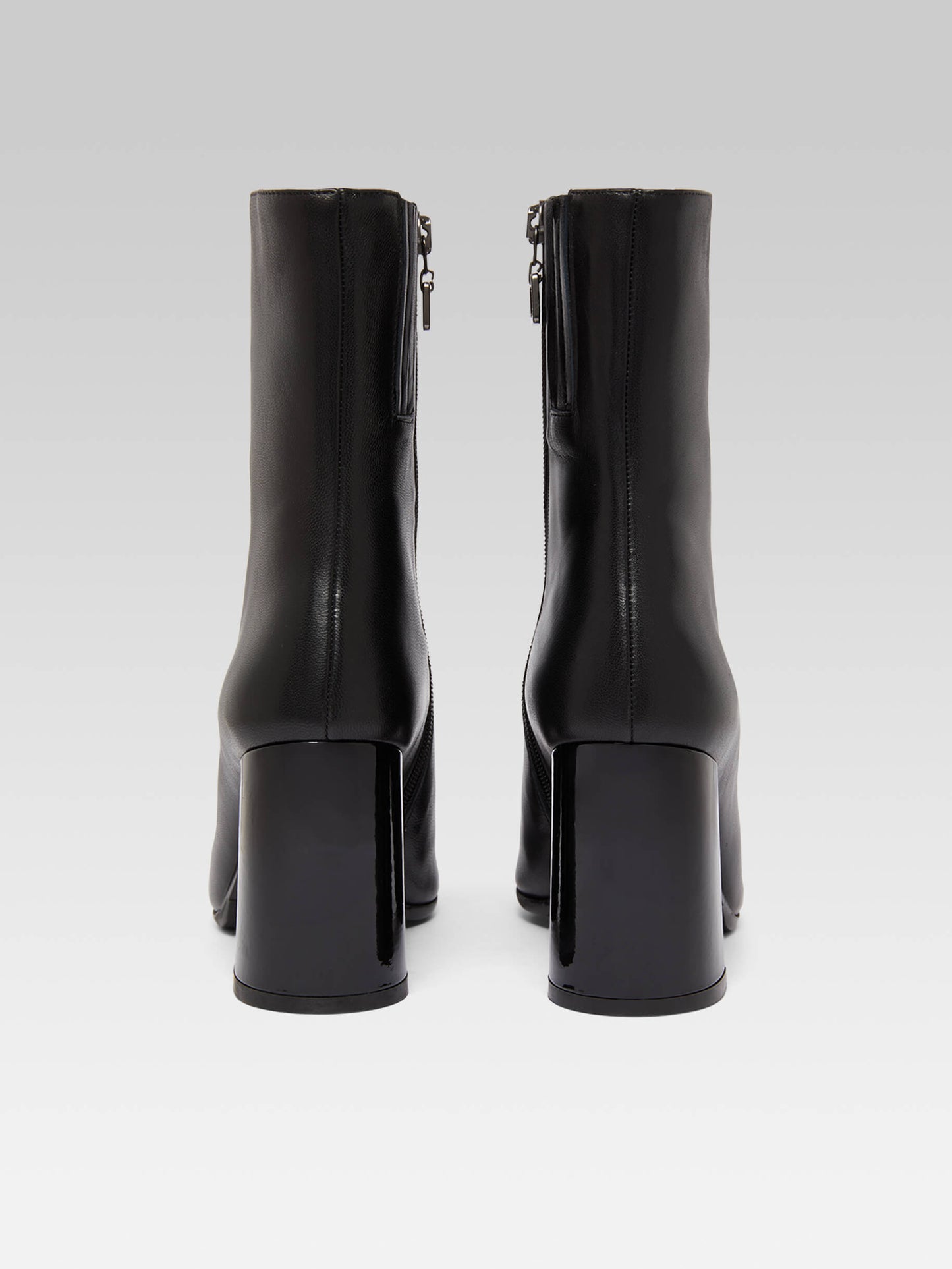 Donna - Black leather and patent ankle boots