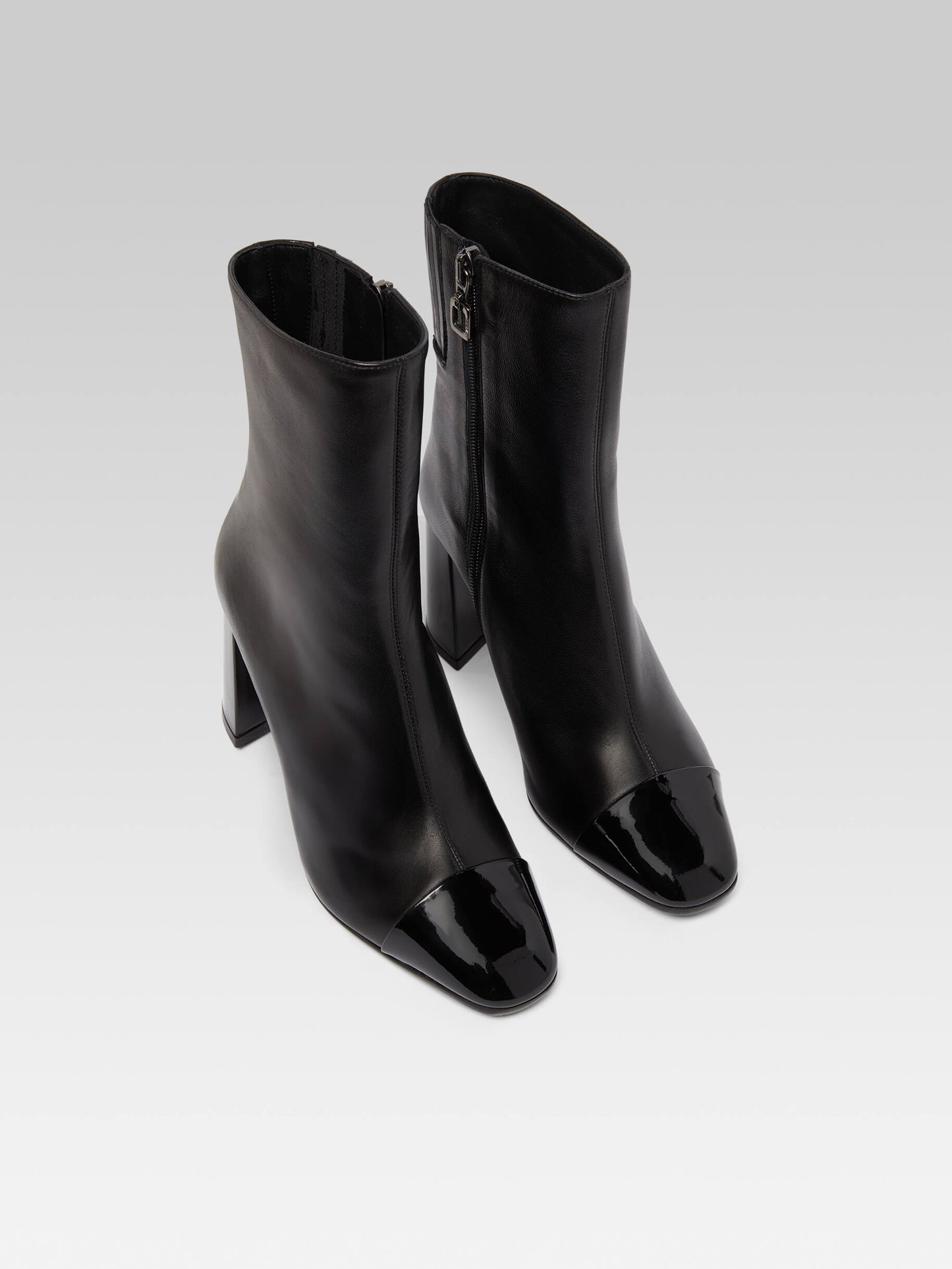 Donna - Black leather and patent ankle boots