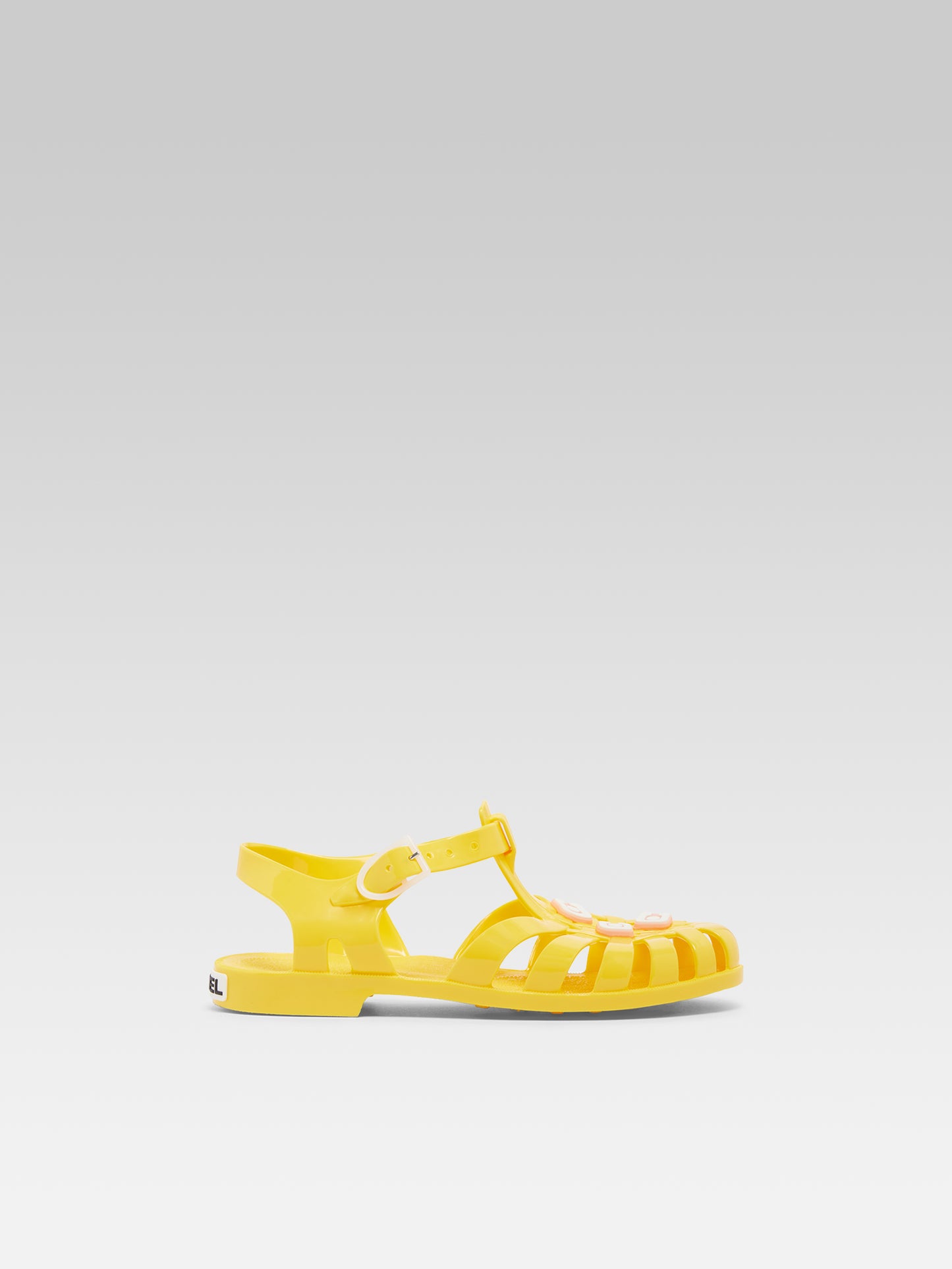 Meduse - Sandales plastique jaune et pin's