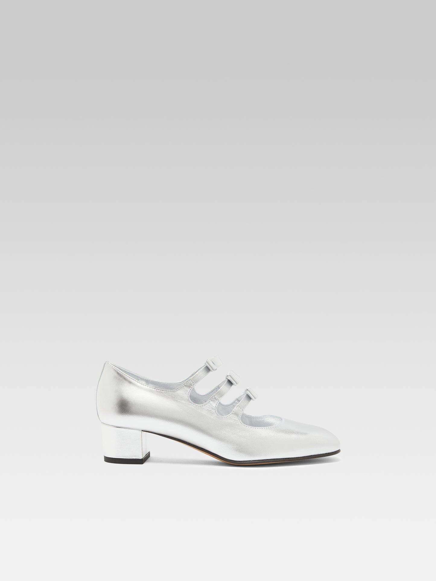 Kinette - Mary janes pumps with bows in silver laminated leather