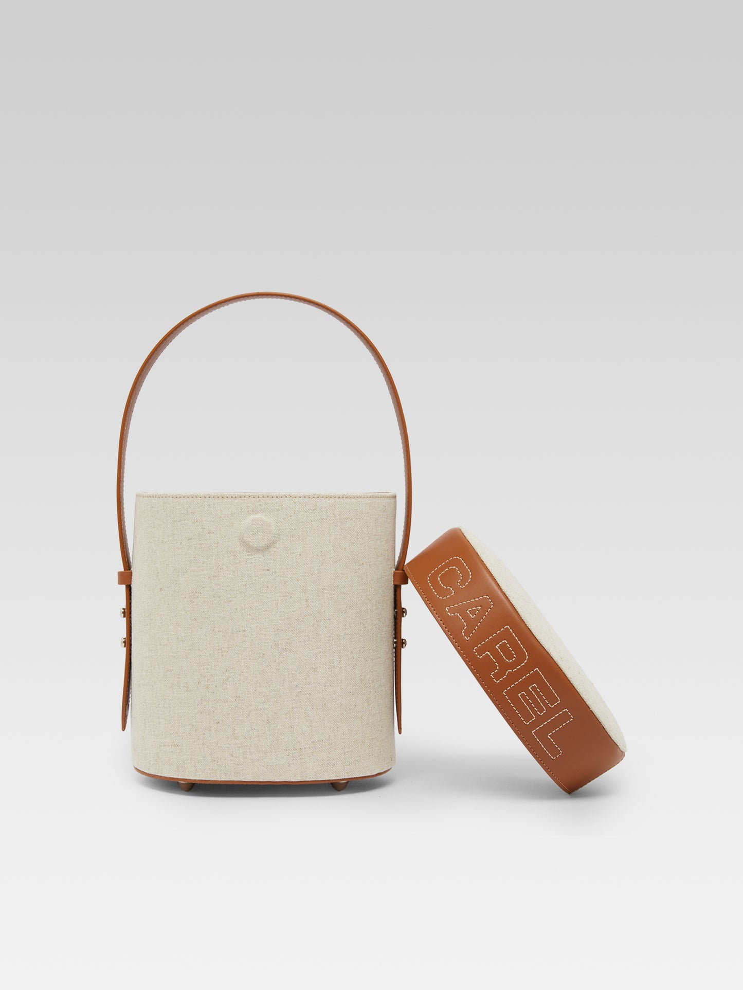 Bibi - Ecru fabric and camel leather bucket bag