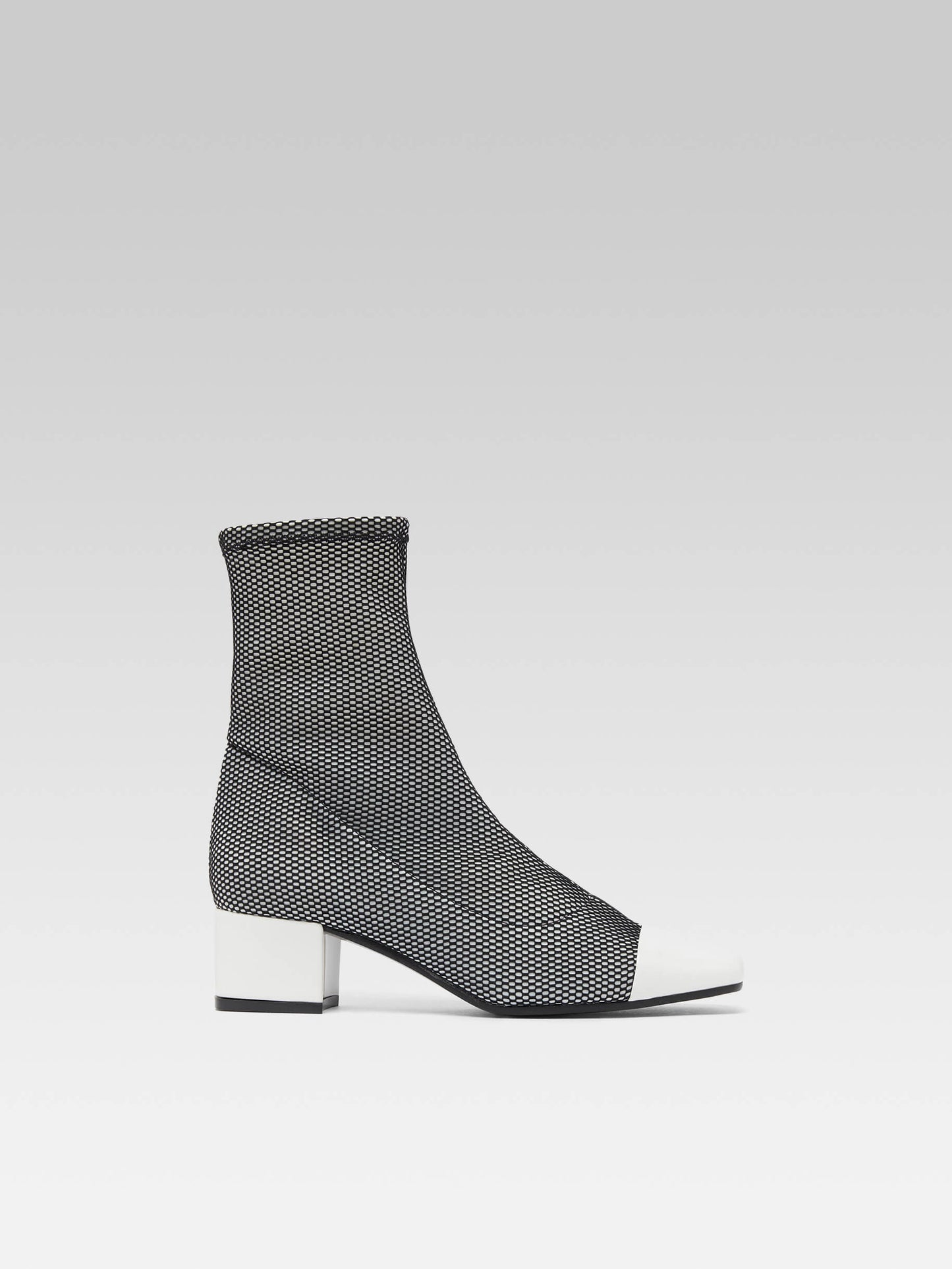 Estime - Black and white stretch fabric and white patent leather ankle boots