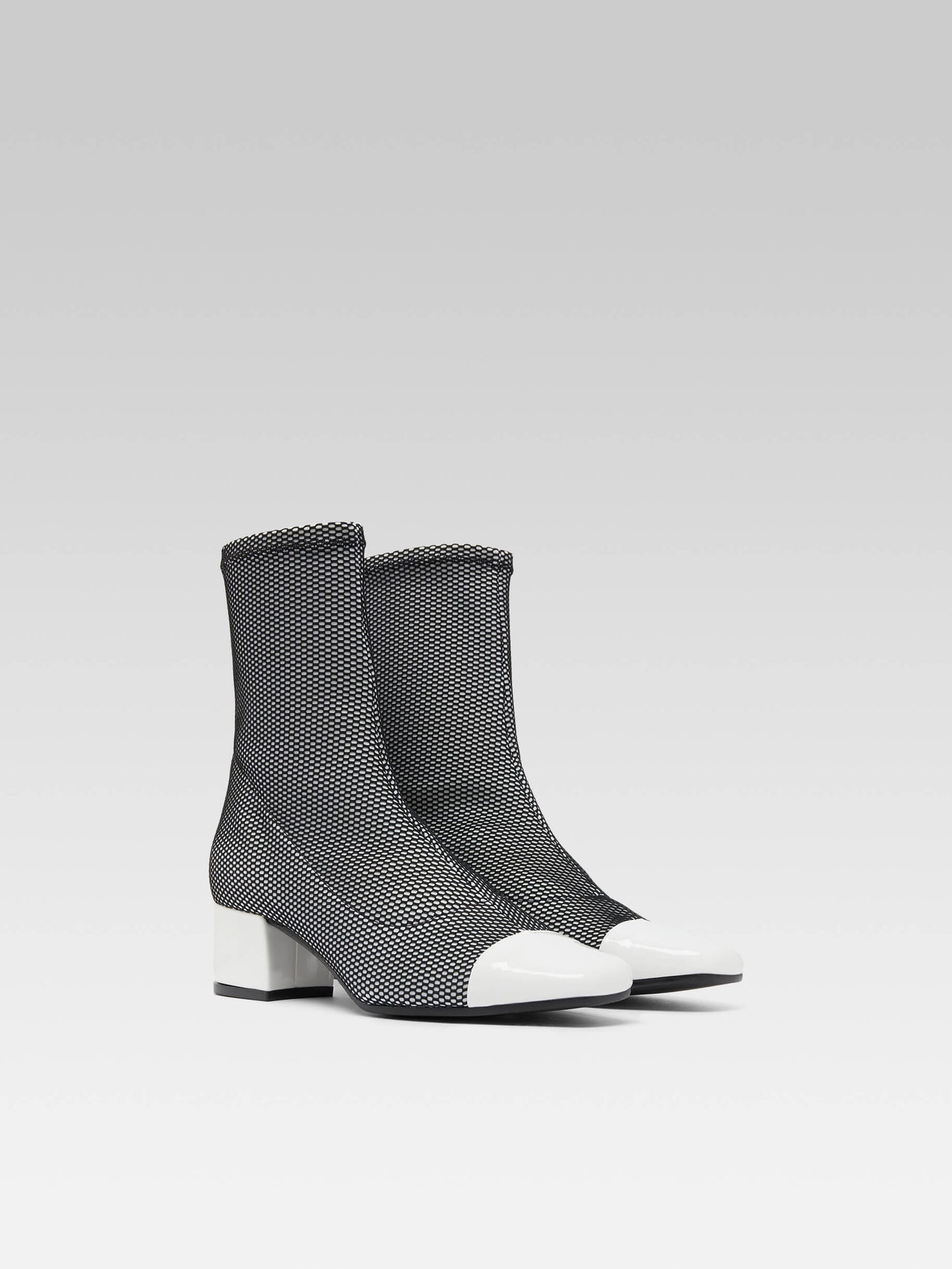 Estime - Black and white stretch fabric and white patent leather ankle boots