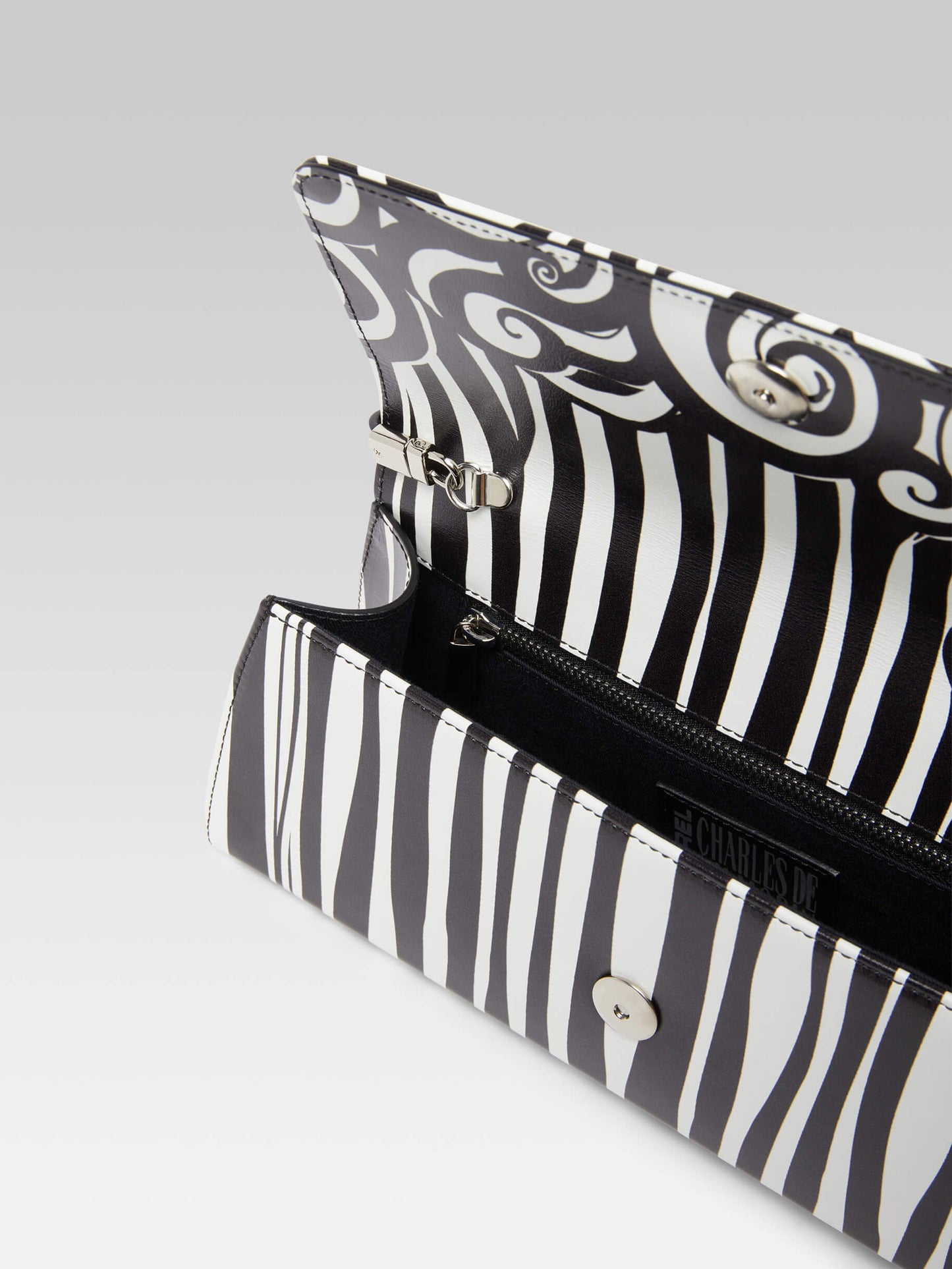 Madeleine - Black and white printed leather bag