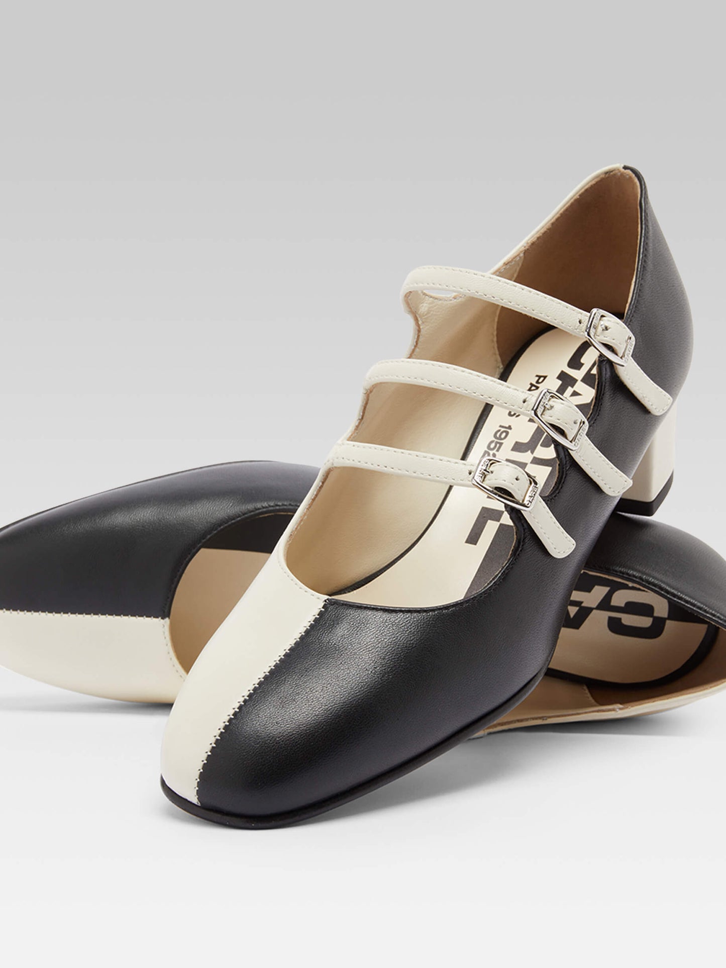 Kina Half - Two-tone black and ivory leather Mary Janes pumps