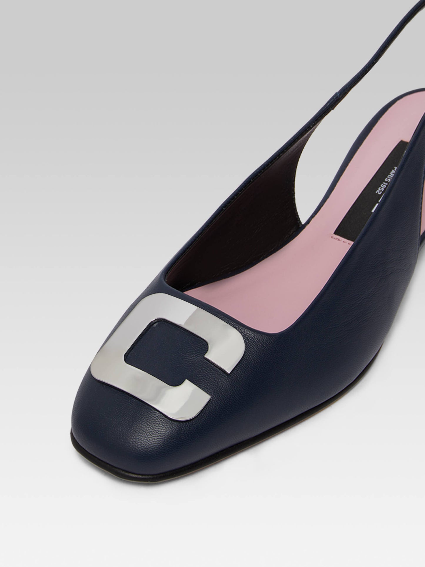 Coquelicot - Navy blue leather slingback with C logo