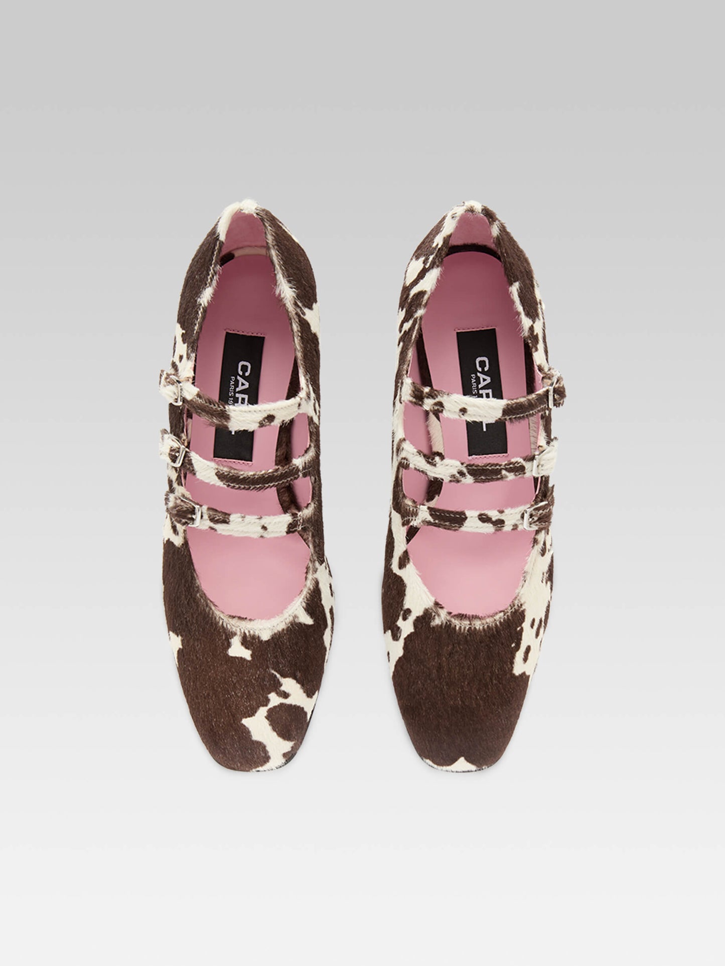 Kina - Cow print pony leather Mary Janes pumps