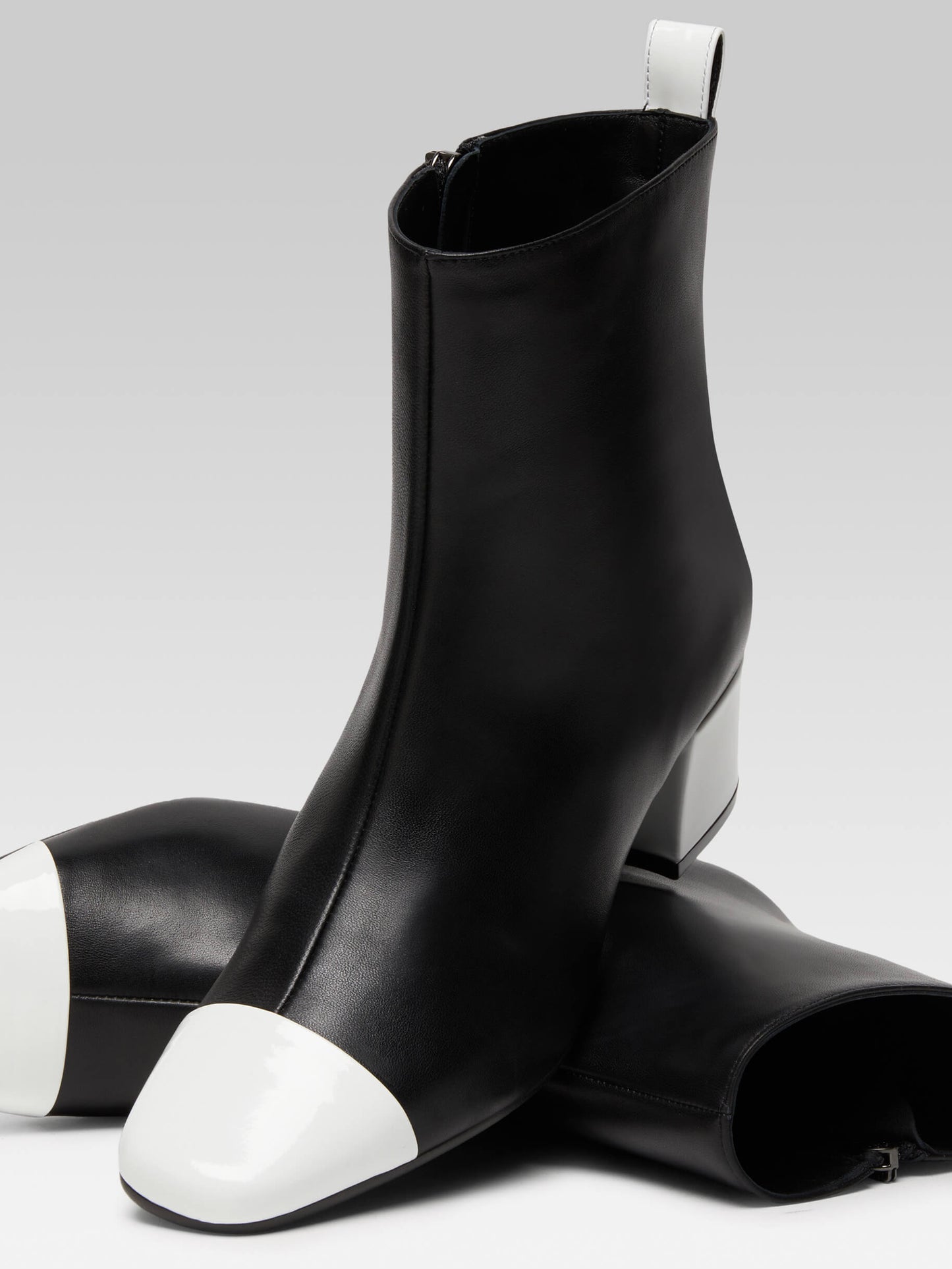 Estime - Black leather and white patent leather ankle boots