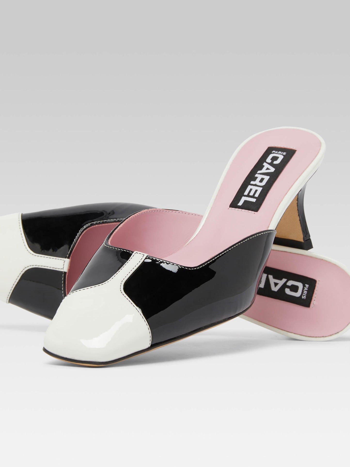 Isa - Mules à talons cuir verni noir et blanc