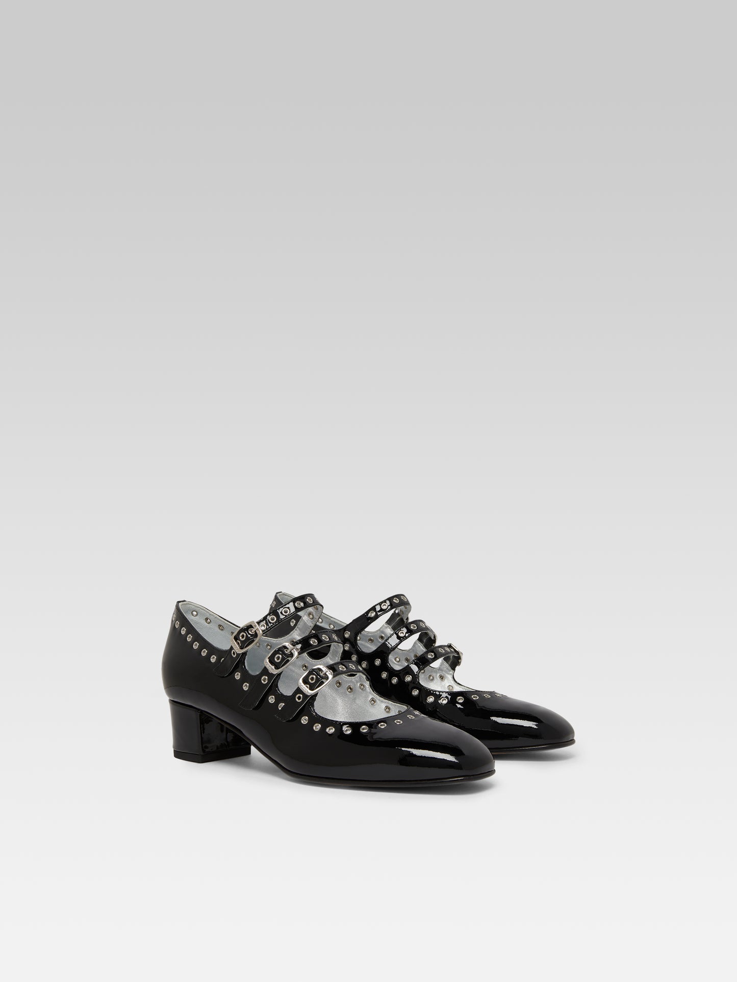 Camden - Black patent leather eyelet Mary Janes pumps