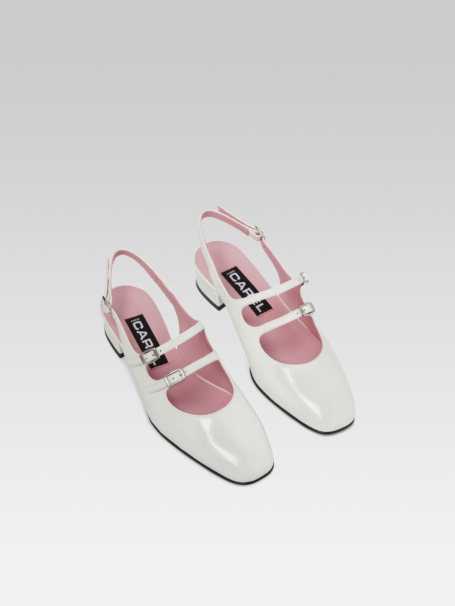 Peche - White patent leather slingback Mary Janes