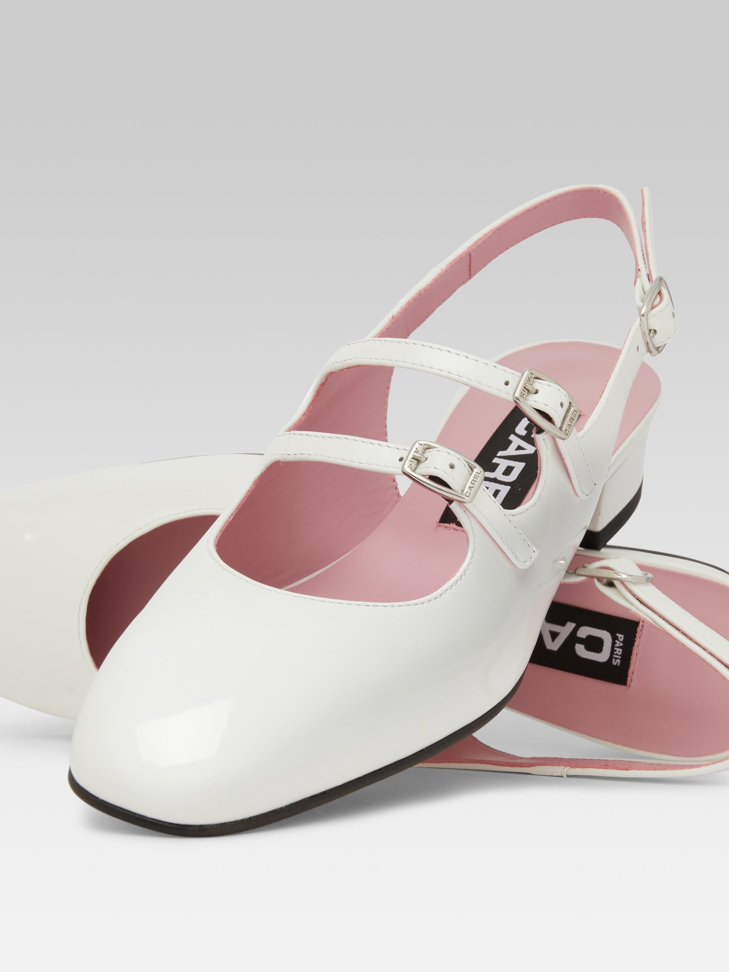 Peche - White patent leather slingback Mary Janes