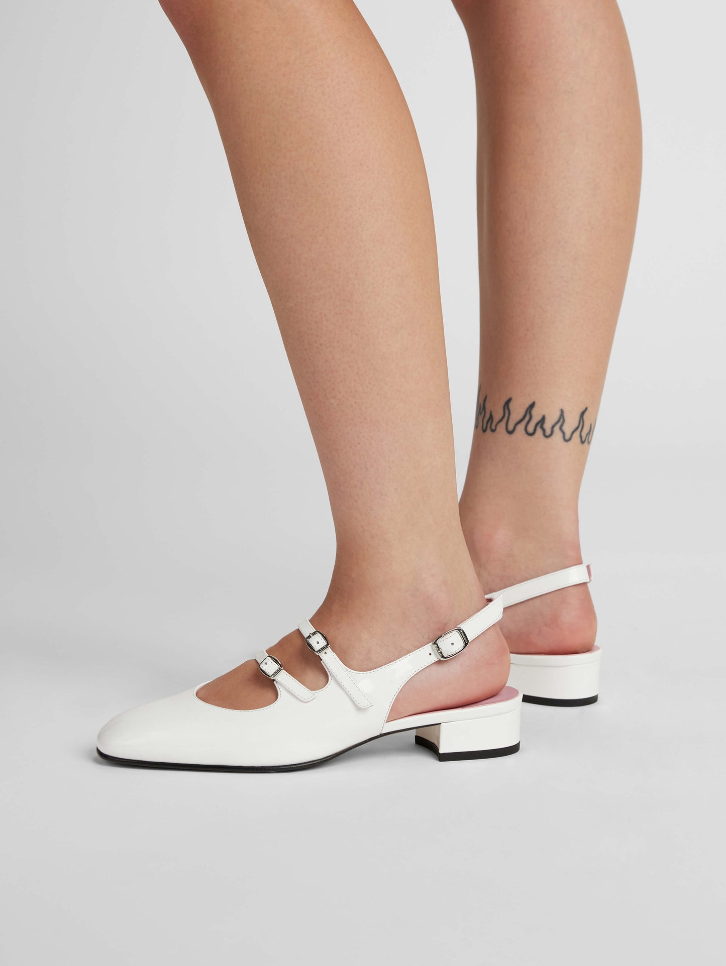 Peche - White patent leather slingback Mary Janes